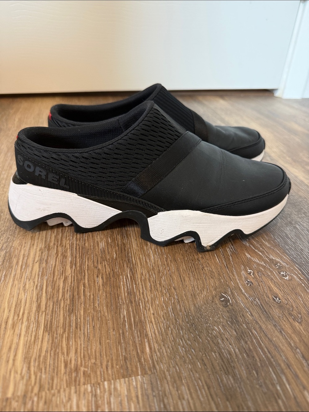 Sorel Black Kinetic Slip-On Sneaker with White Sole